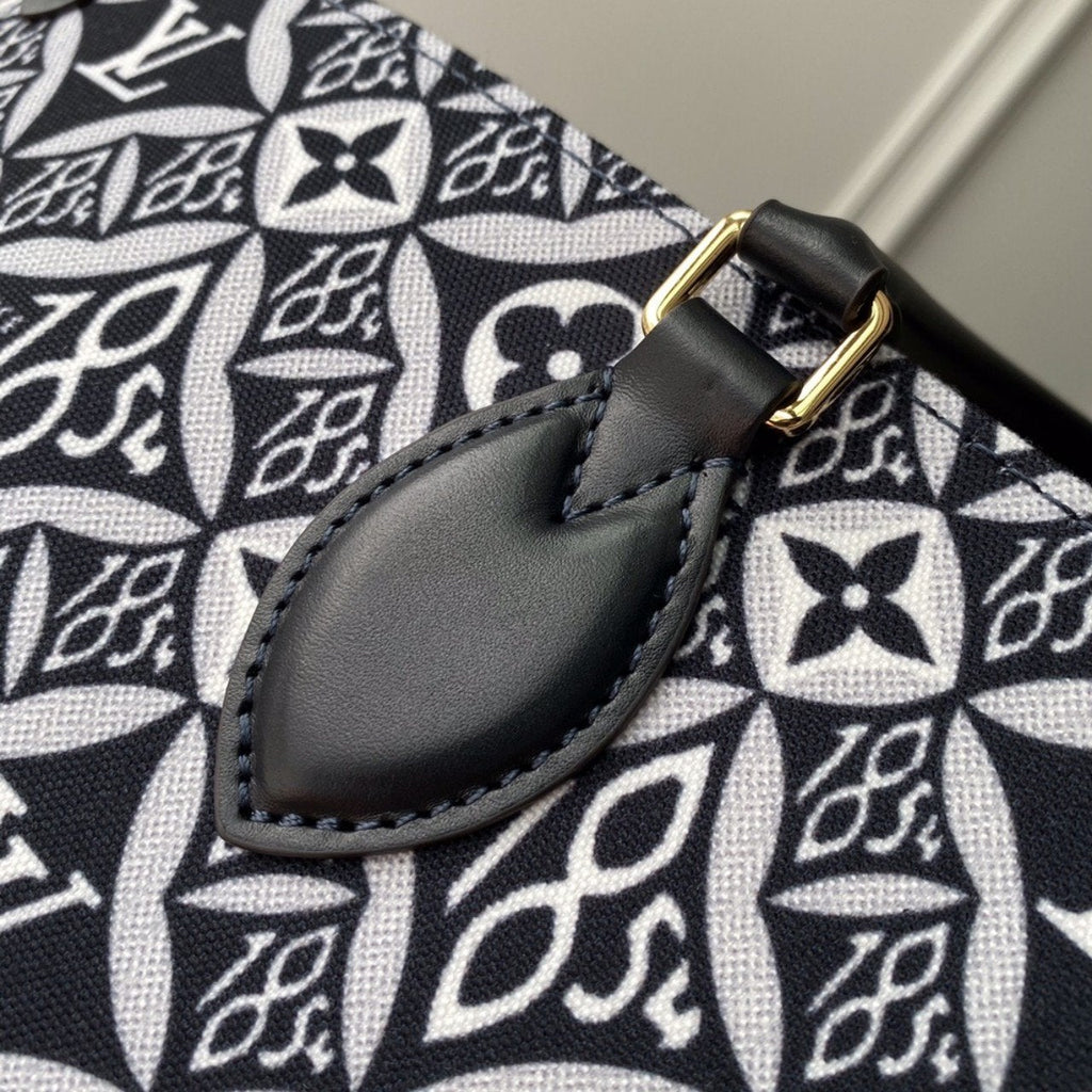 LV DEPUIS 1854 ONTHEGO GM TEXTILE GRIS